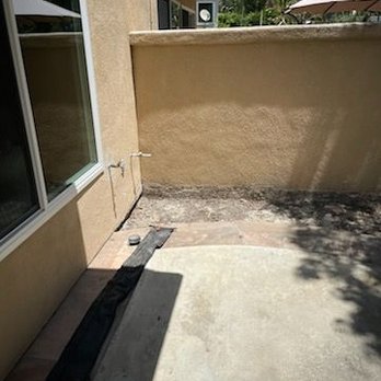 The Orange County Interlocking Paver Co - Concrete panel outside of family room - before - General Contractors Near Me - Newport Beach, California The Orange County Interlocking Paver Co - Concrete panel outside of family room - before - General Contractors Near Me - Newport Beach, California