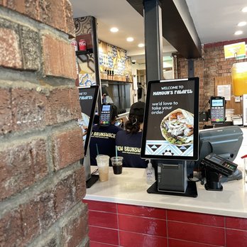 Mamoun's Falafel - Staff on phones. - Middle Eastern Near Me - New Brunswick, New Jersey Mamoun's Falafel - Staff on phones. - Middle Eastern Near Me - New Brunswick, New Jersey