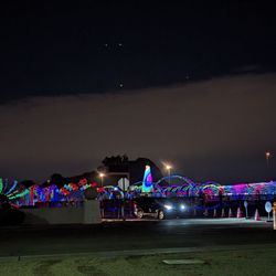 World of Illumination - Looking at most of the light display from parking lot across the street where we put our kids back in their car seats Dec 2022