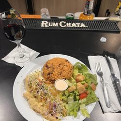 Pikadera’s Spot - Red Snapper fillet prepared with butter on a skillet, "mamposteao" rice and lettuce. Delicious!! Highly recommended!!