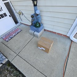 United States Post Office - Left out in wide open area, no cover over head.