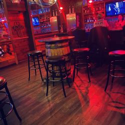 Another Bar in the back it's connected nice size a little more relaxing cozy atmosphere very nice different hours close a little earlier
