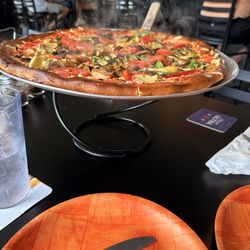 Large pizza with vegan cheese and veggies