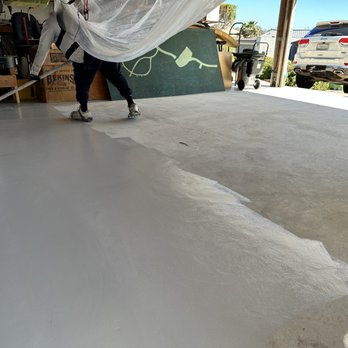 Epoxy Masters - Laying the first epoxy coat. - Flooring Near Me