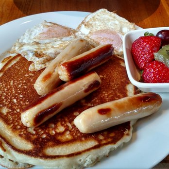 Beachfront Bistro - a breakfast of pancakes, sausages, and fruit - Breakfast & Brunch Near Me - Tofino, British Columbia