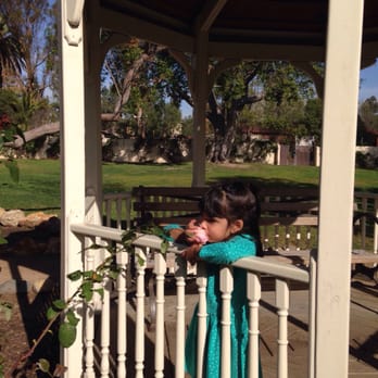 Katie Wheeler Library - The trellis in the Rose garden is always a must-stop-and-smell-the-roses destination when we borrow books here! - Libraries Near Me - Irvine, California Katie Wheeler Library - The trellis in the Rose garden is always a must-stop-and-smell-the-roses destination when we borrow books here! - Libraries Near Me - Irvine, California