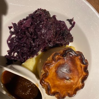 St Stephen's Tavern - Steak & Tangle Foot Pie shortcrust & puff pastry top, buttery mash, Badger beer gravy, braised red cabbage - Fish & Chips Near Me - London, XGL St Stephen's Tavern - Steak & Tangle Foot Pie shortcrust & puff pastry top, buttery mash, Badger beer gravy, braised red cabbage - Fish & Chips Near Me - London, XGL