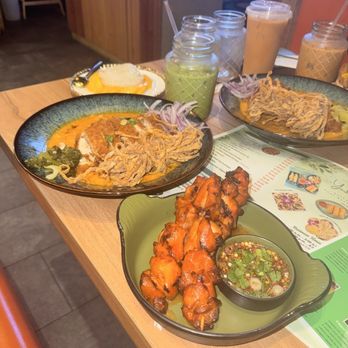 Yark Green - L to R: Chicken Satay, Khao Soi (chicken katsu with curry, egg noodles, red onions, greens), Mango Sweet Rice - Thai Near Me - Katy, Texas