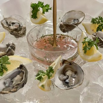 Daniello's - Shikoku oyster w/ wasabi mignonette - Steakhouses Near Me - Roseville, California Daniello's - Shikoku oyster w/ wasabi mignonette - Steakhouses Near Me - Roseville, California