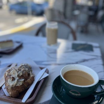 Karak House Coffee - Signature Karak Chai with Almond croissant - Coffee & Tea Near Me - Laguna Hills, California Karak House Coffee - Signature Karak Chai with Almond croissant - Coffee & Tea Near Me - Laguna Hills, California