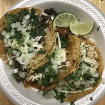 The Taco Stand - (From left to right) steak, pork & chicken taco on the corn tortillas. With cheese! - Tacos Near Me - Garden City, Michigan The Taco Stand - (From left to right) steak, pork & chicken taco on the corn tortillas. With cheese! - Tacos Near Me - Garden City, Michigan