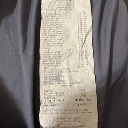 a receipt on a blue shirt a receipt on a blue shirt