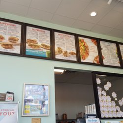Tropical Smoothie Cafe - Menu, gotta extend your neck just to read it lol