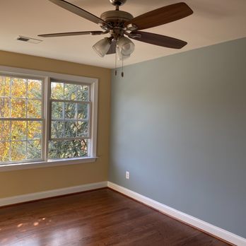Fred General Painting - an empty room with a ceiling fan - Painters Near Me - Vienna, Virginia