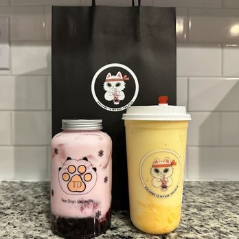 Tea Dojo - Left: Cupid's Arrow Right: Peach Mango Smoothie w/ Mango pudding - Bubble Tea Near Me - Vacaville, California Tea Dojo - Left: Cupid's Arrow Right: Peach Mango Smoothie w/ Mango pudding - Bubble Tea Near Me - Vacaville, California
