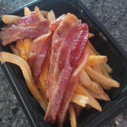 Pretty sure this isn't what the baconator fries look like. Lazy staff Pretty sure this isn't what the baconator fries look like. Lazy staff