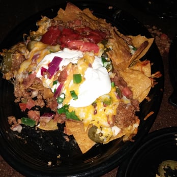 Mick's All American Pub - This is a plate of app nachos its so big!!! Barely made a dent with me and my hubby! Definitely made for a big group!!!! - American Near Me - Lititz, Pennsylvania Mick's All American Pub - This is a plate of app nachos its so big!!! Barely made a dent with me and my hubby! Definitely made for a big group!!!! - American Near Me - Lititz, Pennsylvania