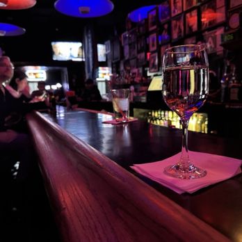 Frolic Room - A glass of Pinot Grigio, poured for Udo Kier; we all took a sip in his memory. - Dive Bars Near Me - Los Angeles, California Frolic Room - A glass of Pinot Grigio, poured for Udo Kier; we all took a sip in his memory. - Dive Bars Near Me - Los Angeles, California