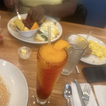 Broken Yolk Cafe - Mangonada drink, The Mom Omelet, biscuit, fresh fruit, short stack buttermilk pancakes (can barely see the edge of it). - Breakfast & Brunch Near Me - Henderson, Nevada Broken Yolk Cafe - Mangonada drink, The Mom Omelet, biscuit, fresh fruit, short stack buttermilk pancakes (can barely see the edge of it). - Breakfast & Brunch Near Me - Henderson, Nevada