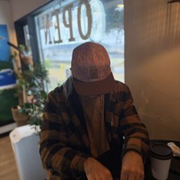 My husband enjoying a trinket while we waited for our made from scratch breakfast. My husband enjoying a trinket while we waited for our made from scratch breakfast.