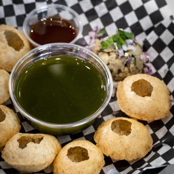 Veggie Planet - a plate of food with dipping sauce - Vegetarian Near Me - Ajax, Ontario