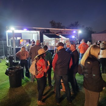 Barbacoa TX - a large group of people standing in front of a food truck - Food Trucks Near Me - Dallas, Texas
