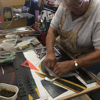 Artistic Designs Enterprises - Sr. Marie fabricating a new stained glass window. - Art Restoration Near Me Artistic Designs Enterprises - Sr. Marie fabricating a new stained glass window. - Art Restoration Near Me