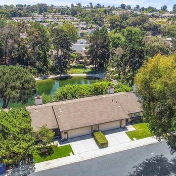 The GreenHouse Group - Birds eye view of the front of the property and a peek at the lake - Mortgage Brokers Near Me - San Diego, California
