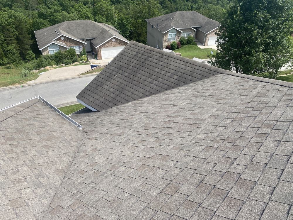 Slide of Strain Roofing