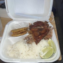 Pernil with tostones and white rice Pernil with tostones and white rice