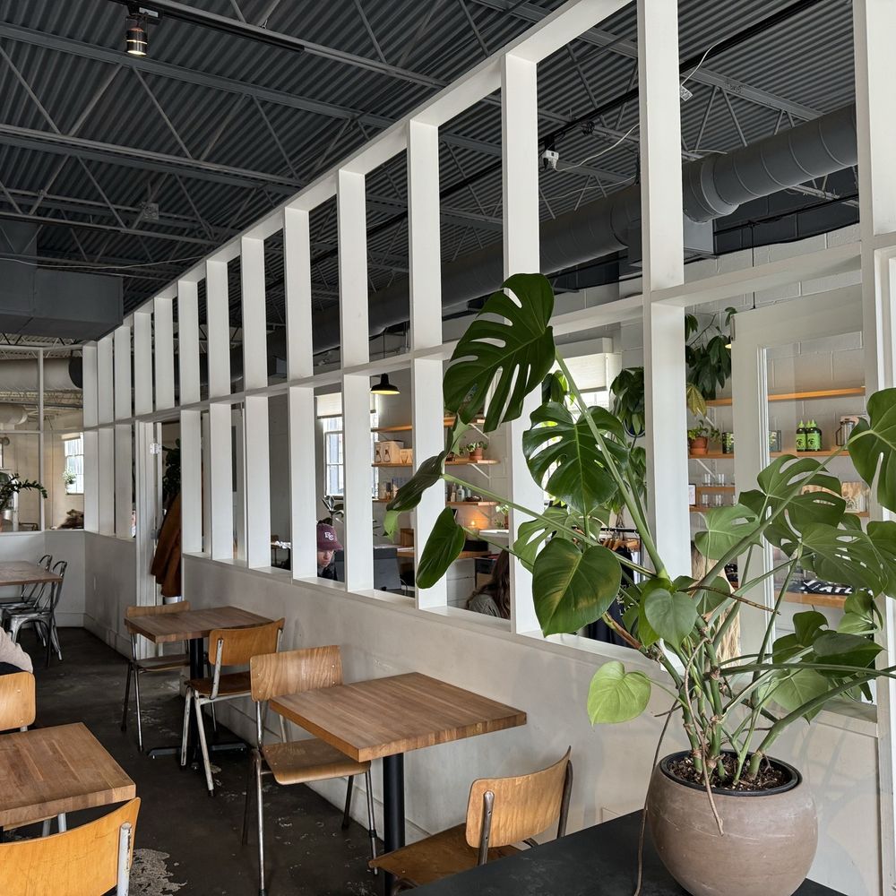 Chrome Yellow  - Interior of coffee shop. Plenty of seating and great decor. - Coffee & Tea Near Me - Atlanta, Georgia