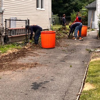 ARB Fence Corp - Workers removing the Bushes and uprooting the roots. - Fences & Gates Near Me - Uniondale, New York ARB Fence Corp - Workers removing the Bushes and uprooting the roots. - Fences & Gates Near Me - Uniondale, New York