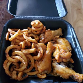 It's Just Wings - a container of fried wings and onion rings - Chicken Wings Near Me - Midwest City, Oklahoma It's Just Wings - a container of fried wings and onion rings - Chicken Wings Near Me - Midwest City, Oklahoma