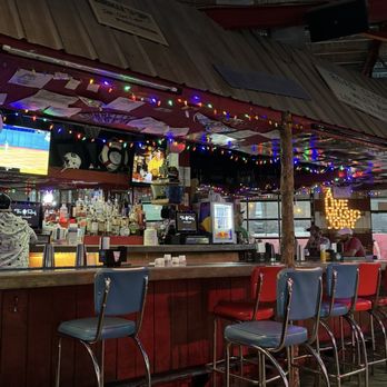 Tin Roof - Part of the bar area. These chairs are removed in preparation for the band. - Bars Near Me - Columbia, South Carolina Tin Roof - Part of the bar area. These chairs are removed in preparation for the band. - Bars Near Me - Columbia, South Carolina