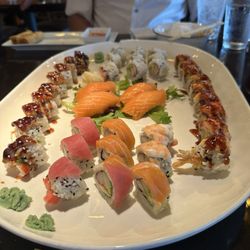 Arata Sushi - Dragon roll and California roll and prospect roll and salmon.