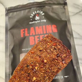 Superior Jerky - Flaming Beef ($12/bag). Not spicy enough for me, but I still like it! 1/14/2023 - Specialty Food Near Me - Orange, California Superior Jerky - Flaming Beef ($12/bag). Not spicy enough for me, but I still like it! 1/14/2023 - Specialty Food Near Me - Orange, California