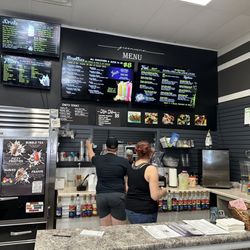 The Green Vine - Front counter where you place your order and pay. They have digital and paper menus.