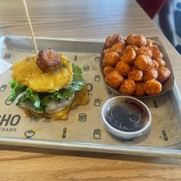 Toston Burger and sweet potato tots. Toston Burger and sweet potato tots.