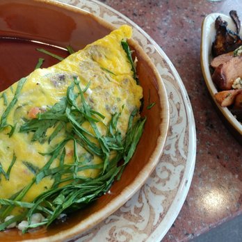 Another Broken Egg Cafe - Veggie omelet with upgraded Mediterranean potatoes. - Breakfast & Brunch Near Me - Winter Park, Florida