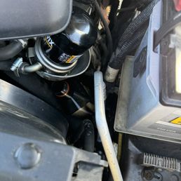 Plastic oil bottle left in my engine compartment.