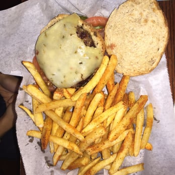 Trainwreck Saloon - Burger with pepper jack cheese and season fries - Sports Bars Near Me - Saint Louis, Missouri Trainwreck Saloon - Burger with pepper jack cheese and season fries - Sports Bars Near Me - Saint Louis, Missouri