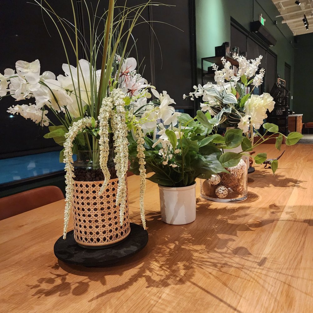 Starbucks - a row of flower pots on a wooden table - Coffee & Tea Near Me - Livermore, California Starbucks - a row of flower pots on a wooden table - Coffee & Tea Near Me - Livermore, California