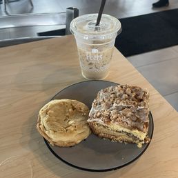 Cookie on the left & coffee cake on the right with fancy coffee