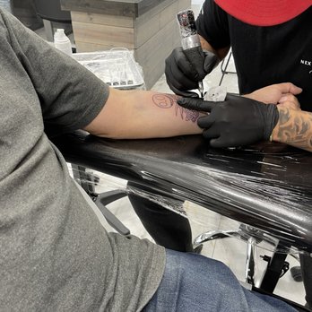 Next Generation Tattoo - Hubby getting his first tattoo at 47! - Tattoo Near Me - Riverview, Florida