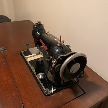 Piccolo's Italian Restaurant - Antique sewing machine. - Italian Near Me - Lenoir, North Carolina