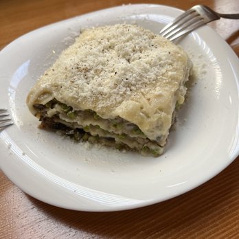 Pasta Casalinga - White lasagna with peas, mushrooms, sausage, and bechamel - Italian Near Me - Seattle, Washington