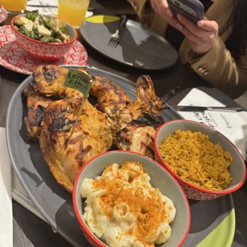 Elite Event: Nando's - Montrose - Chicken with rice, Mac and cheese, and Brussels - Yelp Events Near Me - Houston, Texas