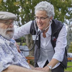 ElderHealth & Living Memory Village - Liz von Wellsheim, GNP meeting with residents where they are, on the golf course.