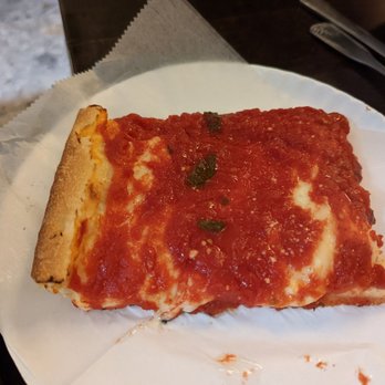 Villa Milano - Upside down Sicilian slice (sauce on top and cheese under that) - Italian Near Me - Manhasset, New York Villa Milano - Upside down Sicilian slice (sauce on top and cheese under that) - Italian Near Me - Manhasset, New York