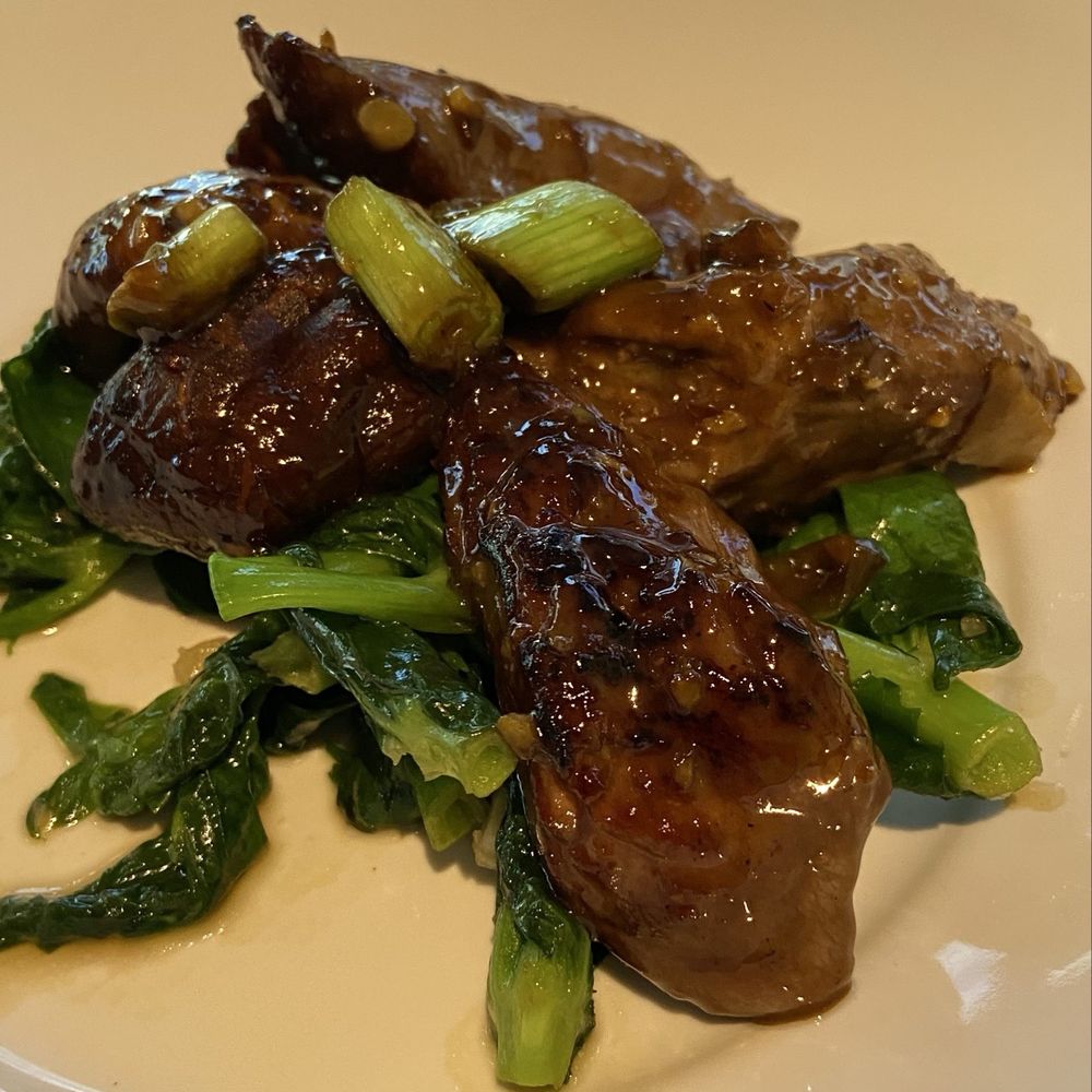 Kwok's Bistro - 2026 Chinese New Year menu - stir fried lamb tenderloin with shiitake mushrooms and pea shoots - Chinese Near Me - Reno, Nevada Kwok's Bistro - 2026 Chinese New Year menu - stir fried lamb tenderloin with shiitake mushrooms and pea shoots - Chinese Near Me - Reno, Nevada